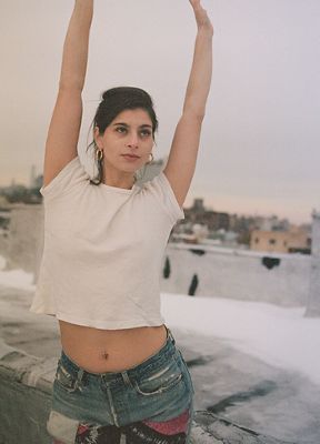 Liana Satenstein standing on a rooftop