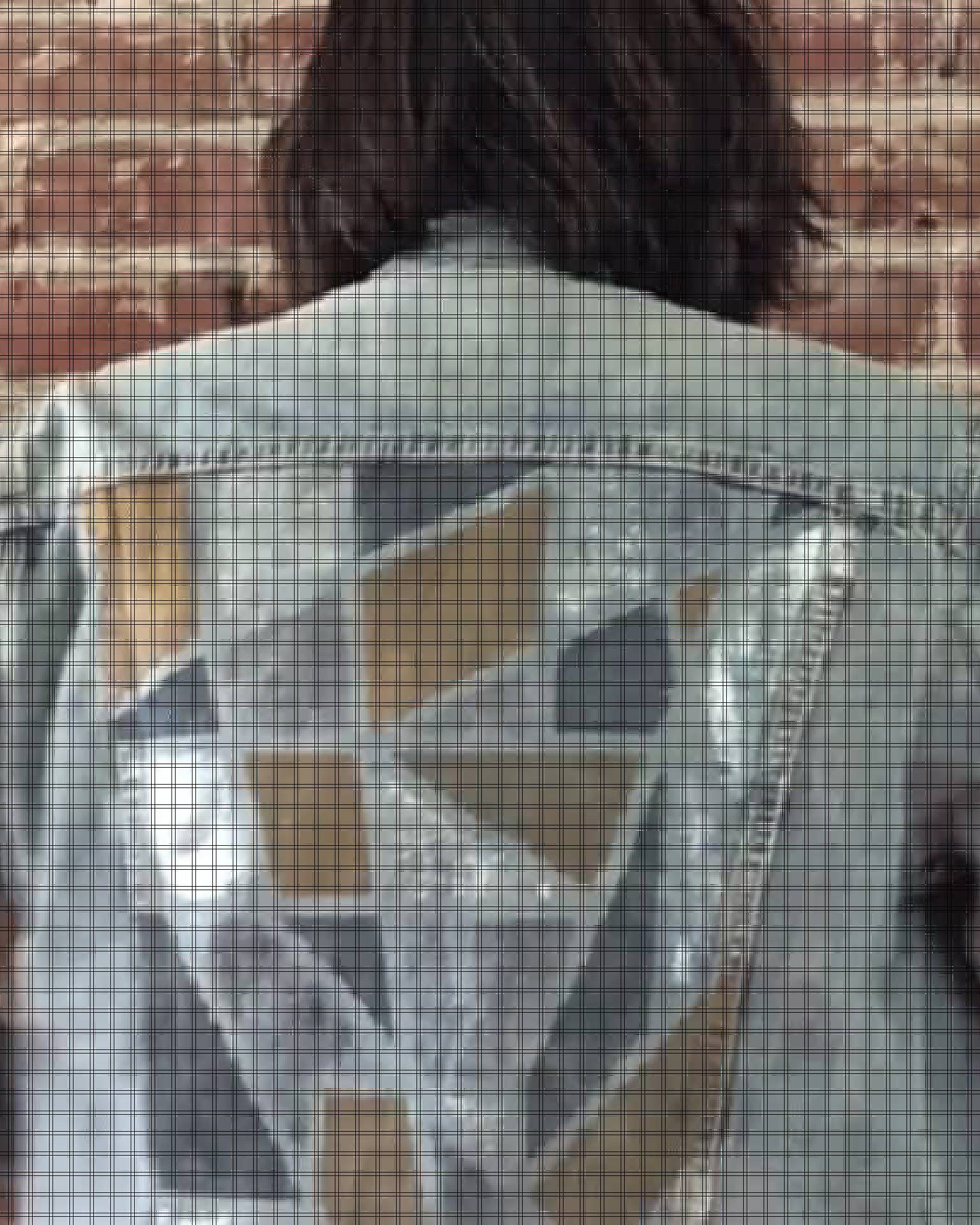 Video of Levi's® tailor, Jen Sharkey, smiling while holding up her newly designed trucker jacket and putting it on.