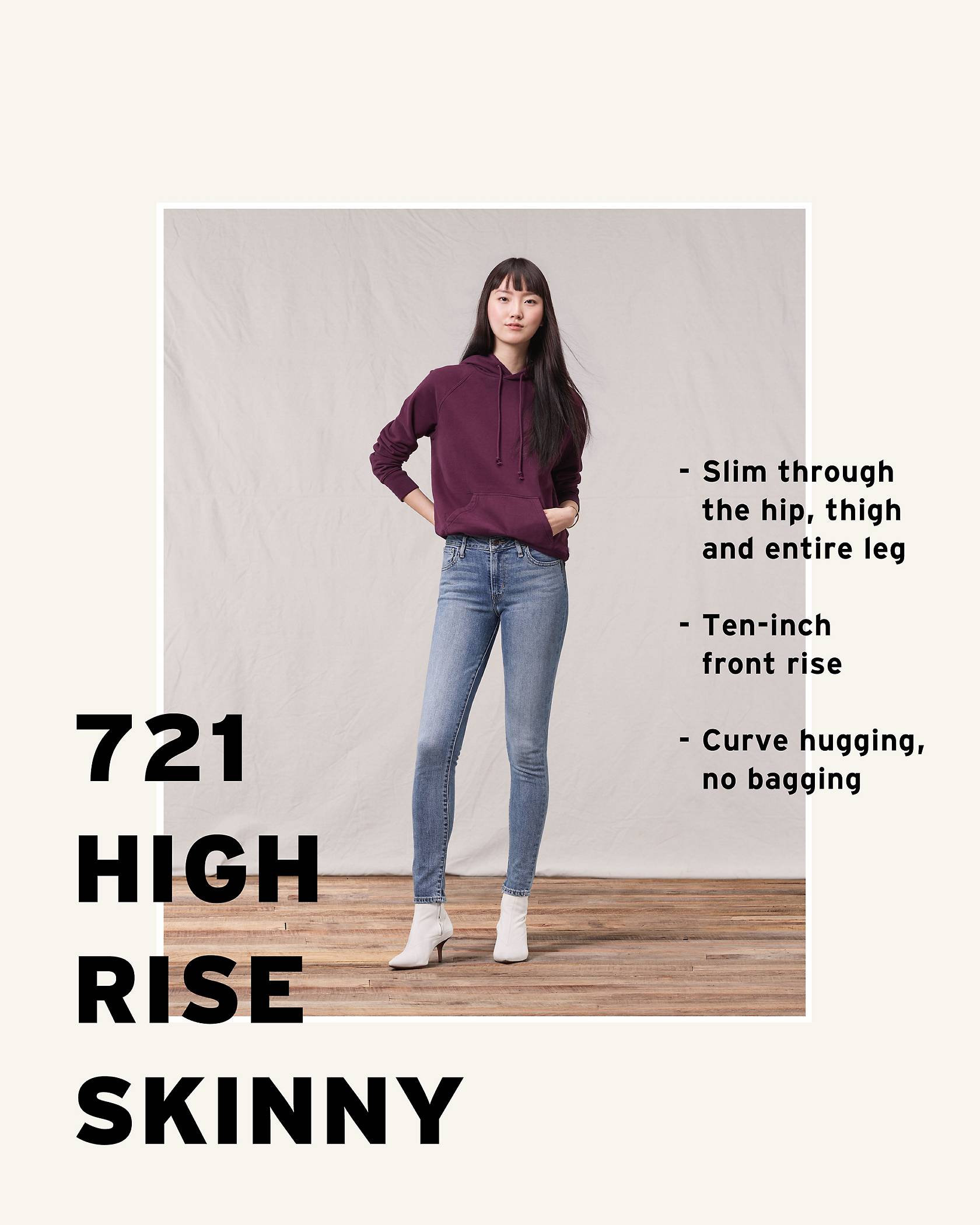 Model wearing a purple sweatshirt and medium wash 721 High Rise Skinny Jean.