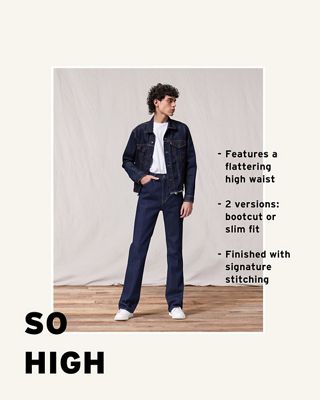 Model wearing the So High men's jeans with his right hand in his right pocket as he looks off to the left side.