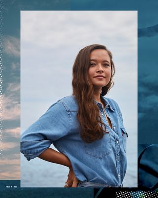 A portrait shot of Melati Wijsen wearing a Levi's button up