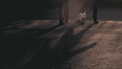 A gif of children playing soccer