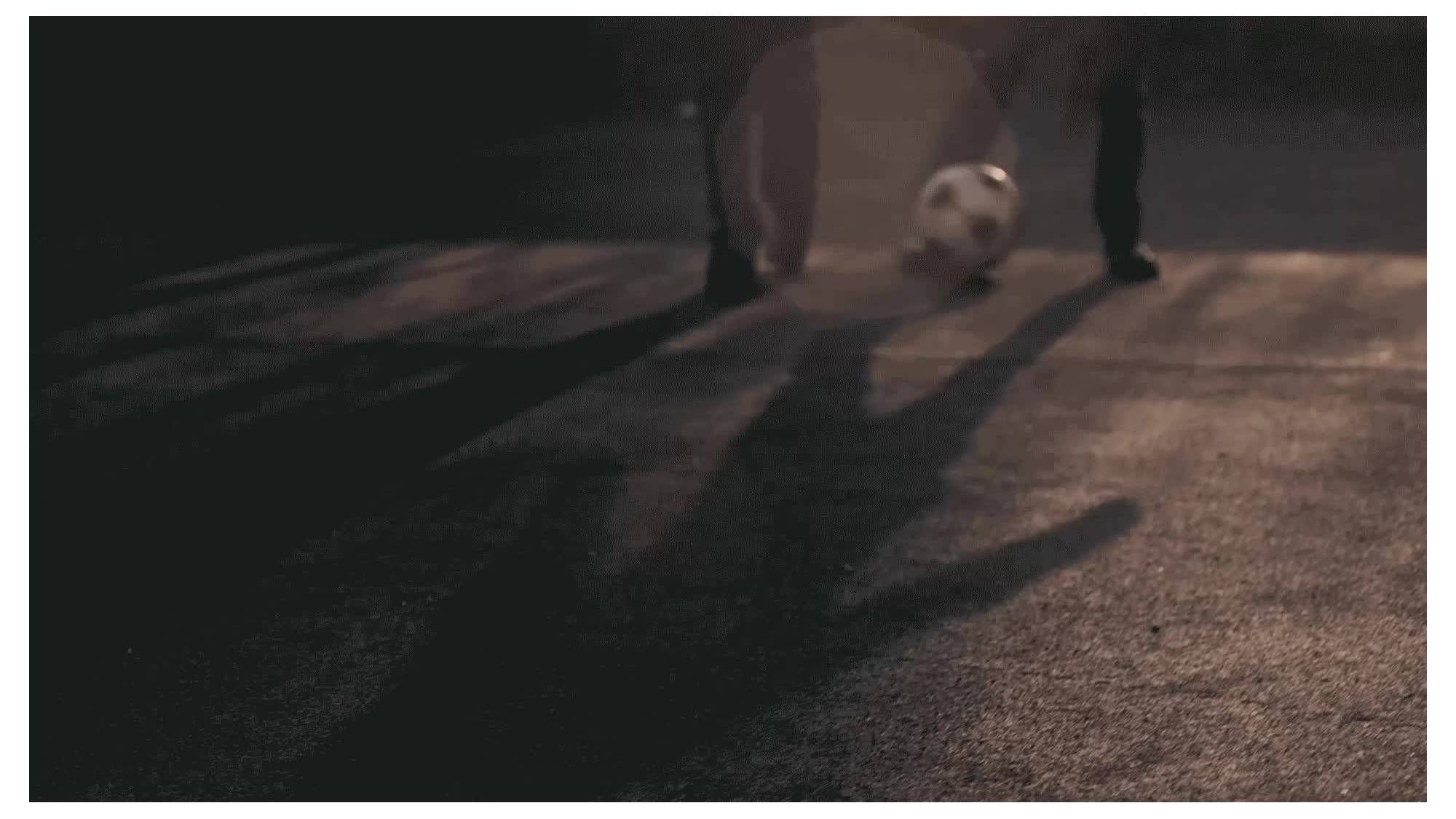 A gif of children playing soccer