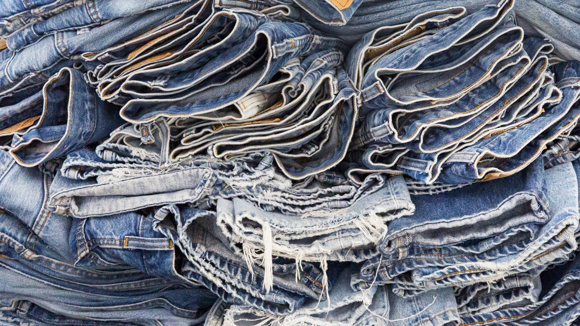 jeans stacked on top of each other