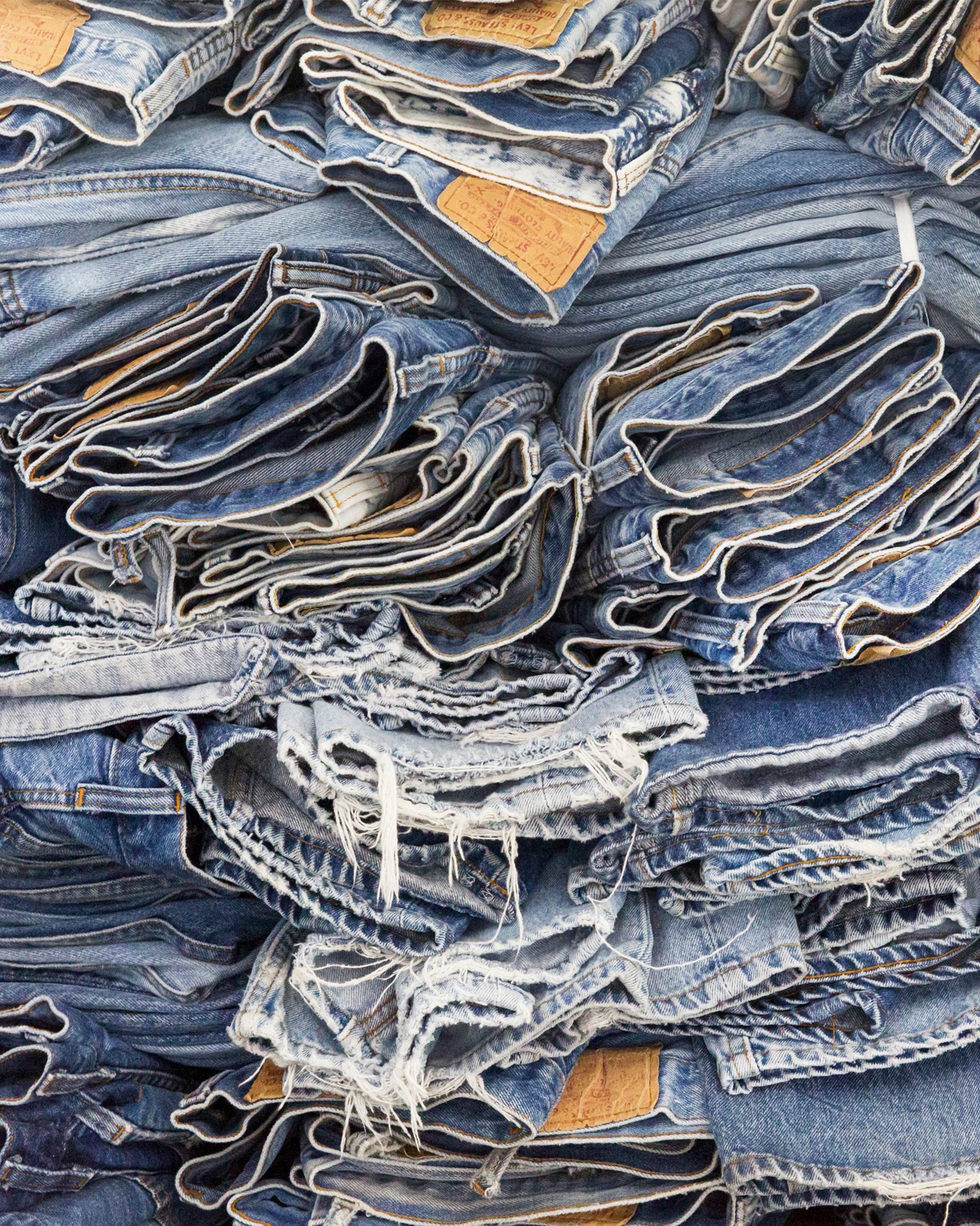 jeans stacked on top of each other