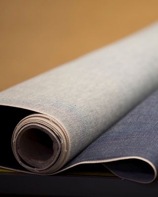 denim being rolled up