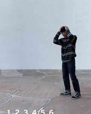 mens holiday style, man jumping