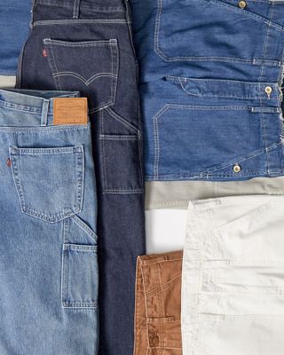 Flat lay image of jeans on the floor.