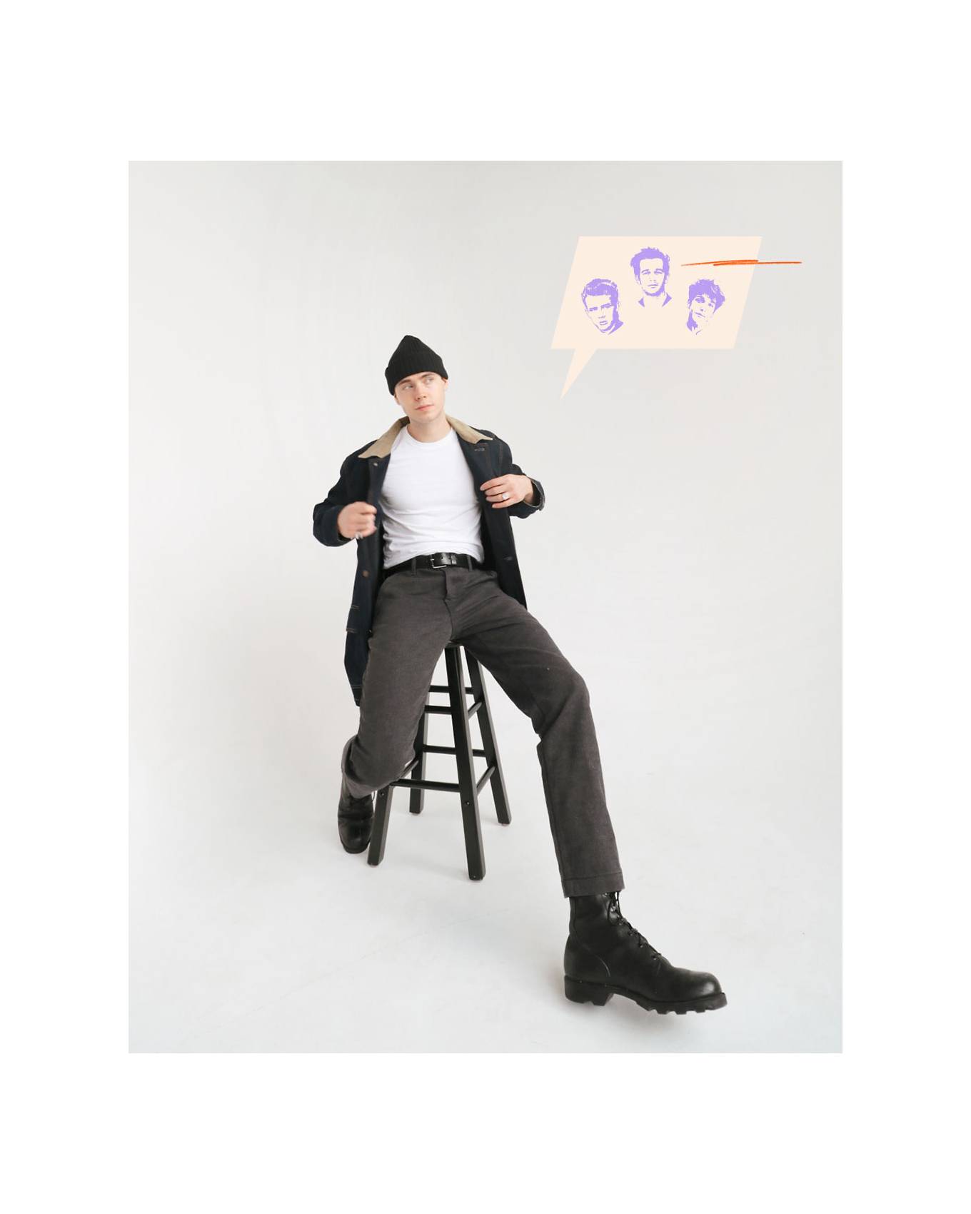 Gabe sitting on a stool against a white backdrop wearing black chinos, white tee, beanie and dark wash denim jacket with an illustrated thought bubble