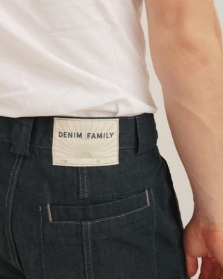 Rotating gif of different crops of various capsule wardrobe styles either laid flat or worn by Gabe