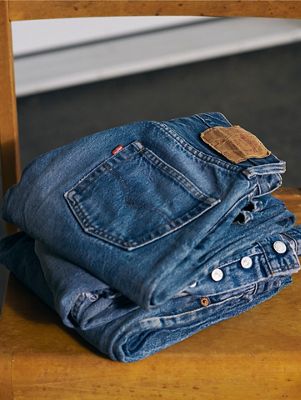 Close up shot of a stack of 501 blue jeans
