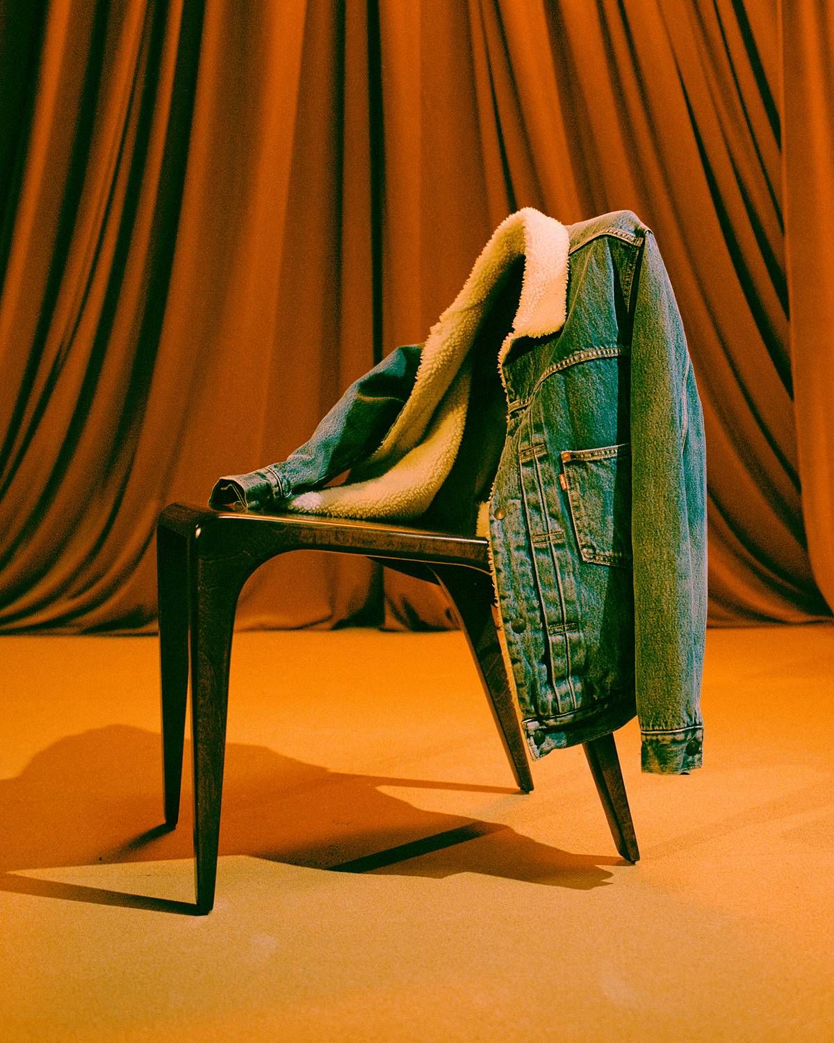 Sherpa Trucker Jacket draped over a chair