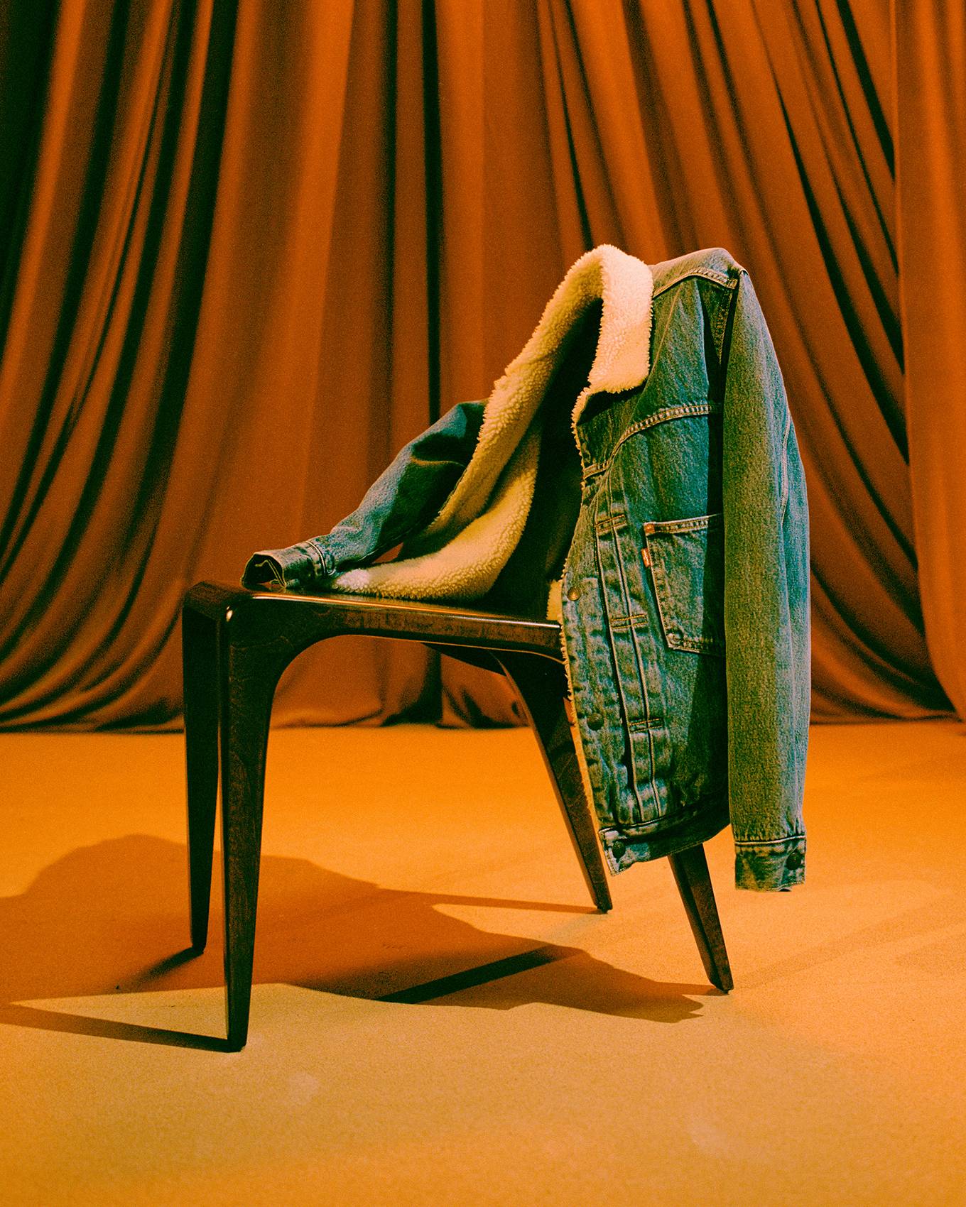 Sherpa Trucker Jacket draped over a chair.