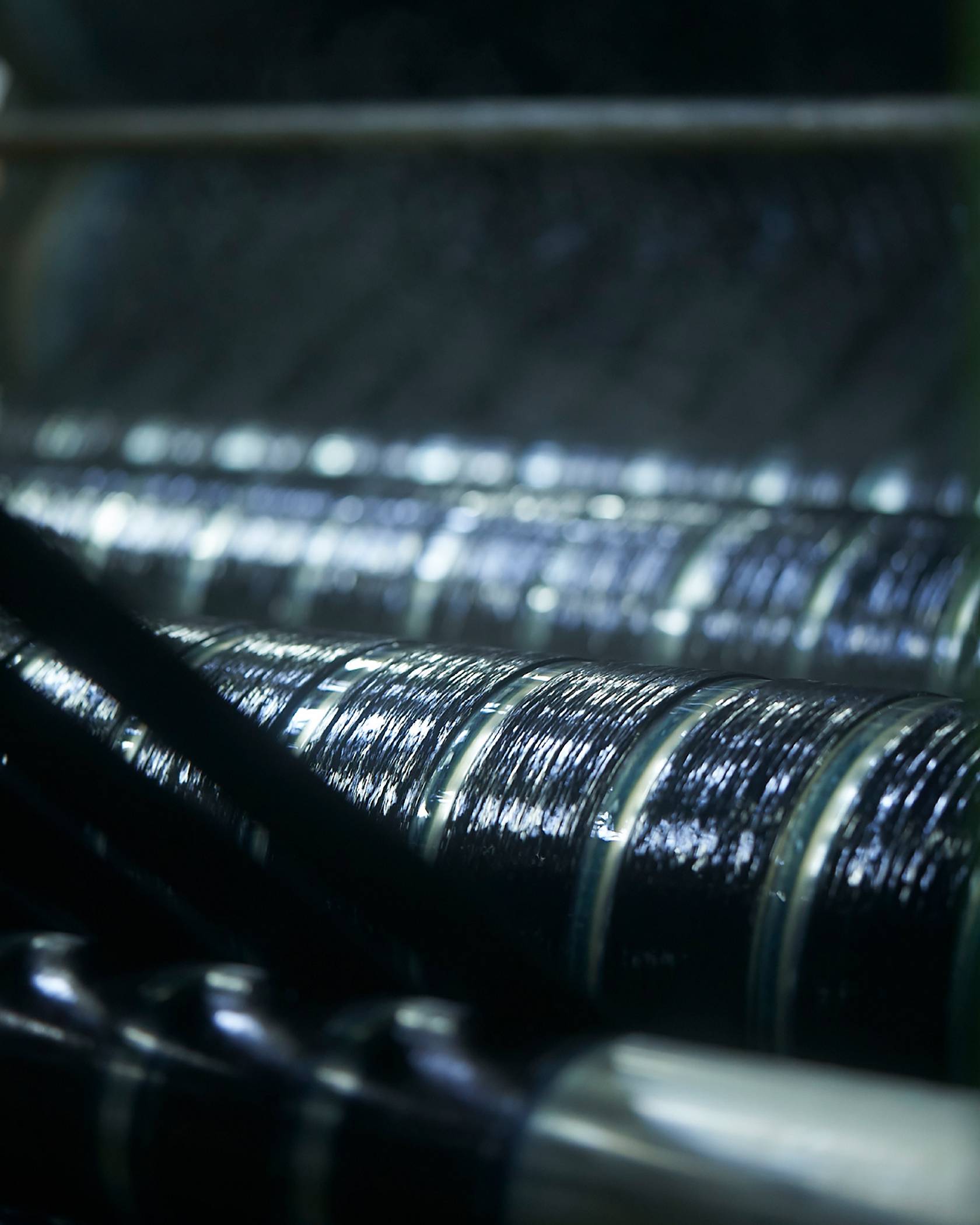 Kaihara’s manufacture process close up image of with their manufacture of handwoven indigo-dyed kasuri textile.