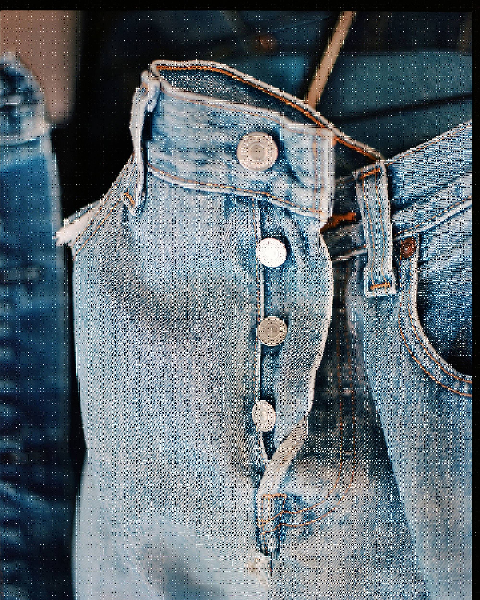 Levis 501® Jeans styled close up on fabric and button fly