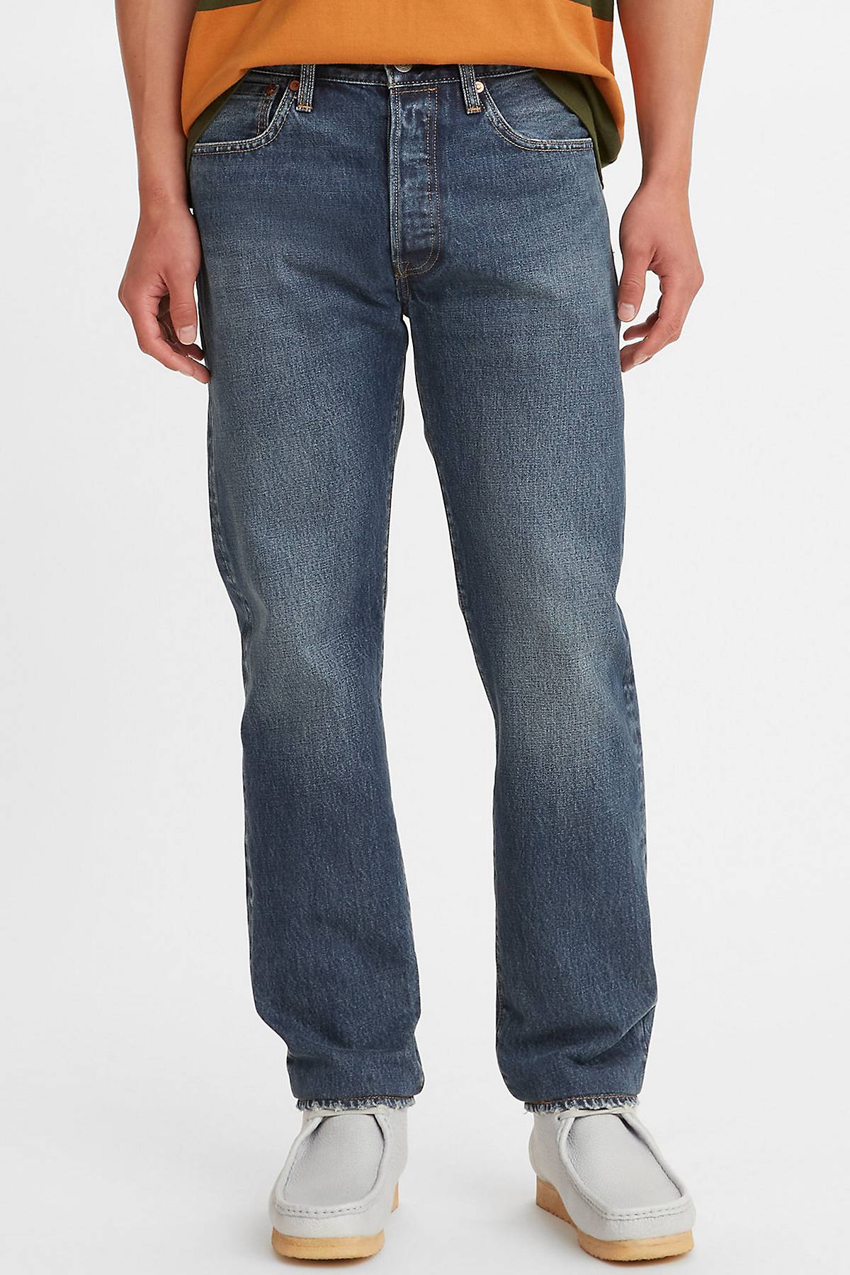 Model wearing 501® Slim Taper Jeans
