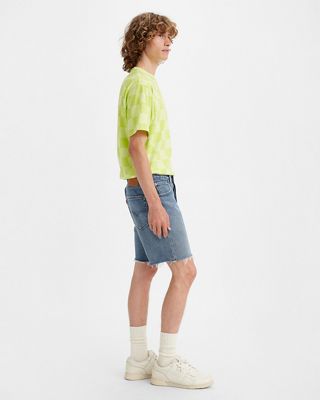 Man wearing denim Shorts