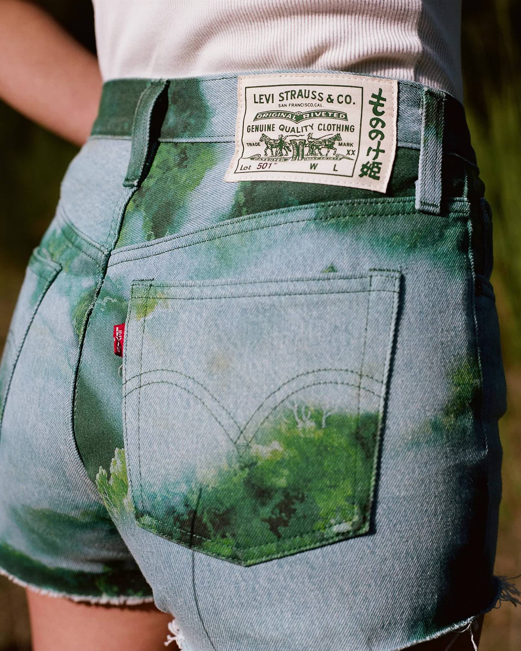 Image of Levi's® back pocket detail of denim shorts featuring Levi's® x Princess Mononoke artwork plus actual film still from Princess Mononoke