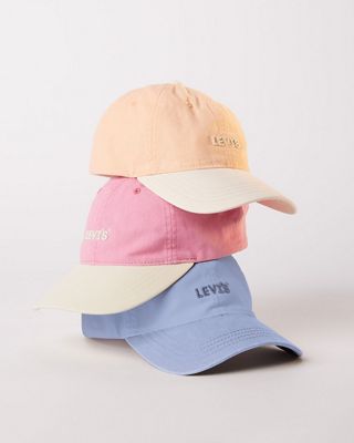 Stack of candy colored caps