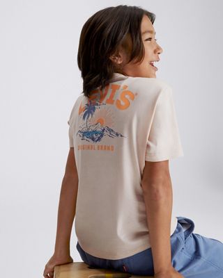 Model in kids' graphic tee