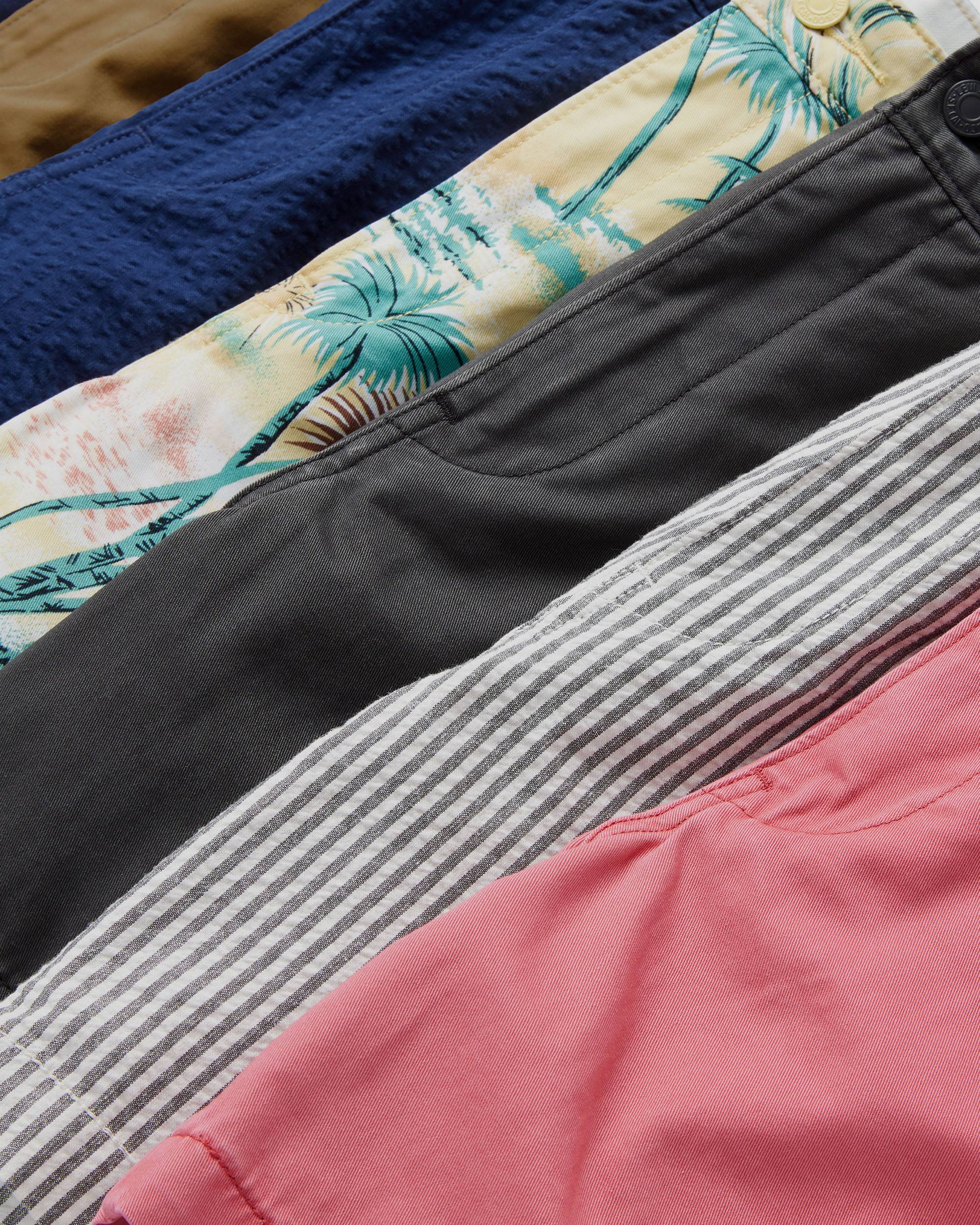 Flat lay of multi color & pattern XX Chino Shorts
