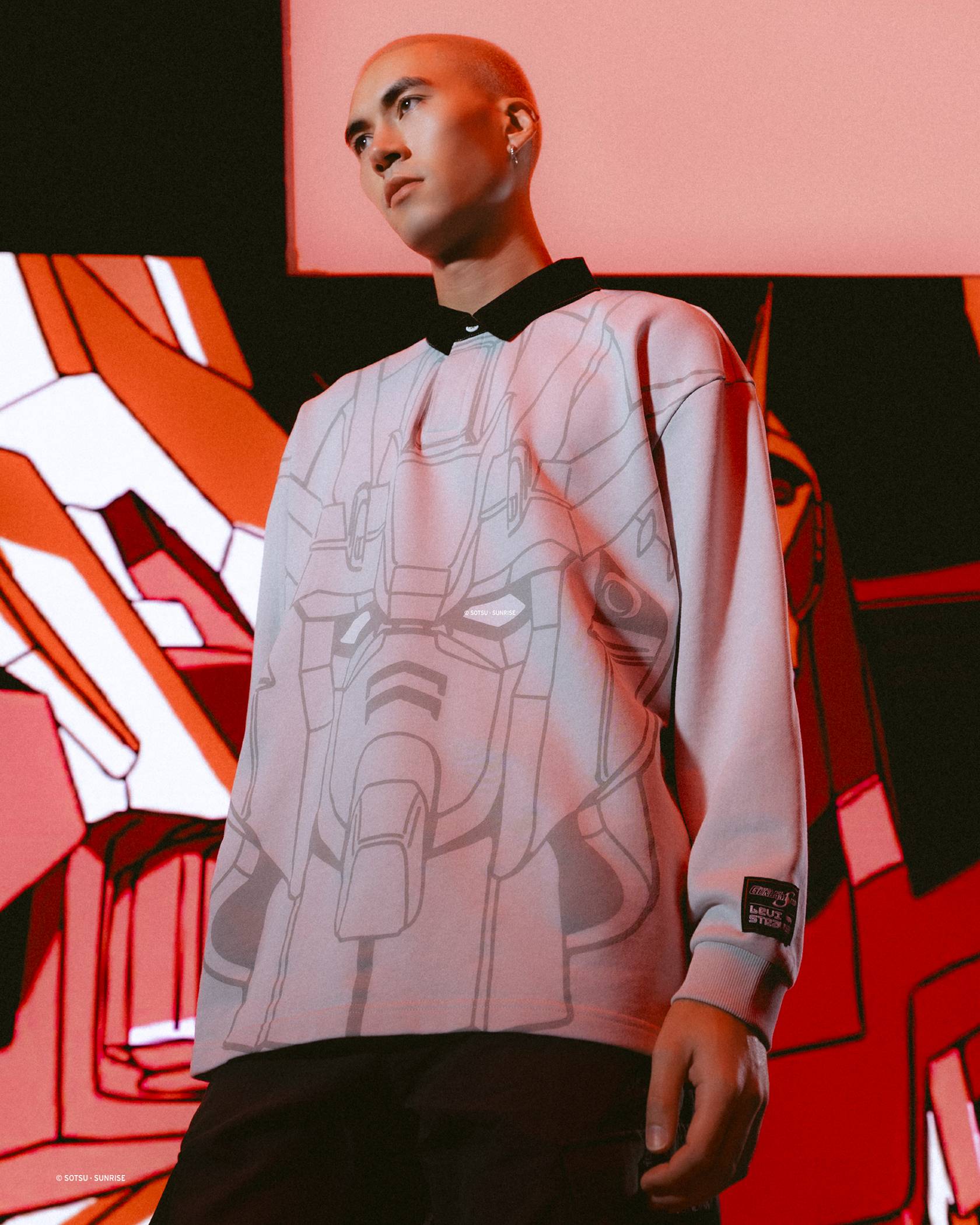 Image of male model wearing futuristic clothing against Sci-fi background