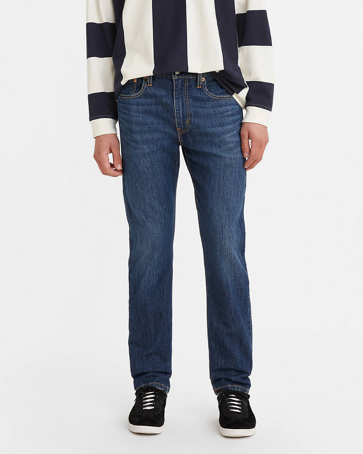 Man in tapered jeans