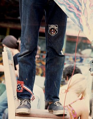 a photo from the waist down of someone wearing 501 jeans