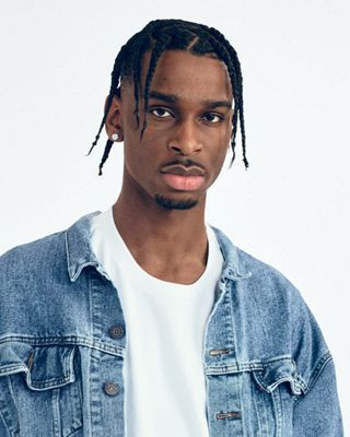 three photos of Shai wearing Levi's trucker jacket and jeans