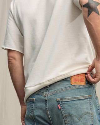 A man wearing 531 athletic slim jeans