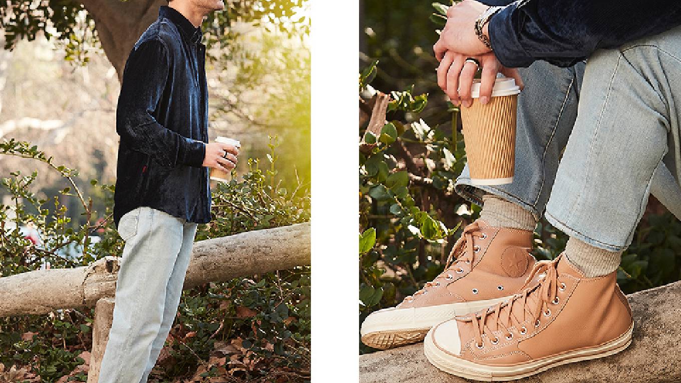 Two images of Criss, on the left he's wearing light wash jeans, and on the right is a close up of jeans, converse and coffee