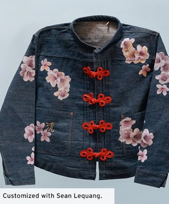 A custom trucker jacket with flowers on it