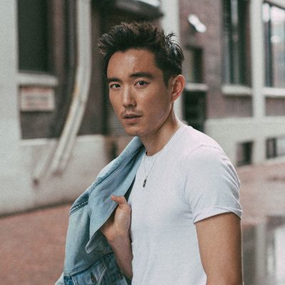 a portrait shot of JUSTIN H. MIN