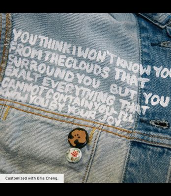 AAPI Leigh Jacket Details featuring a quote painted on the inside and a tree painted on the outside
