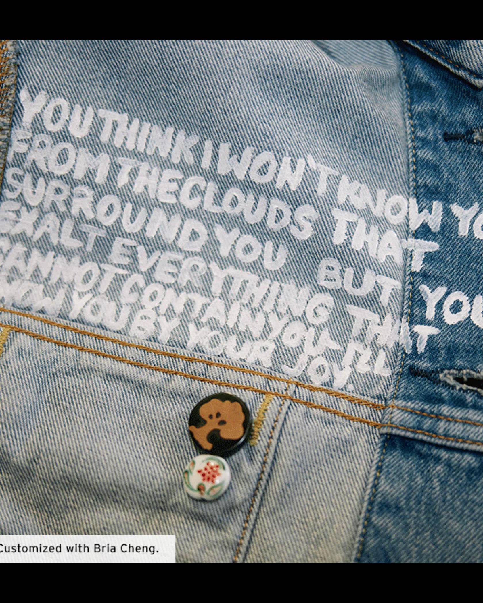 AAPI Leigh Jacket Details featuring a quote painted on the inside and a tree painted on the outside