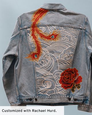 A customized trucker jacket with flowers and waves