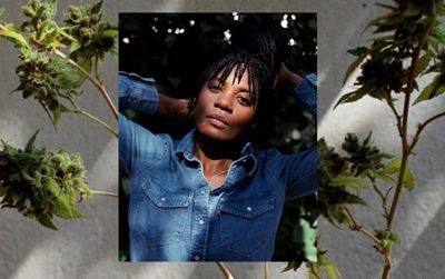 Portrait of Mennlay Golokeh Aggrey wearing a Levi's Western Shirt. The photo is overlaid on an image of cannabis.