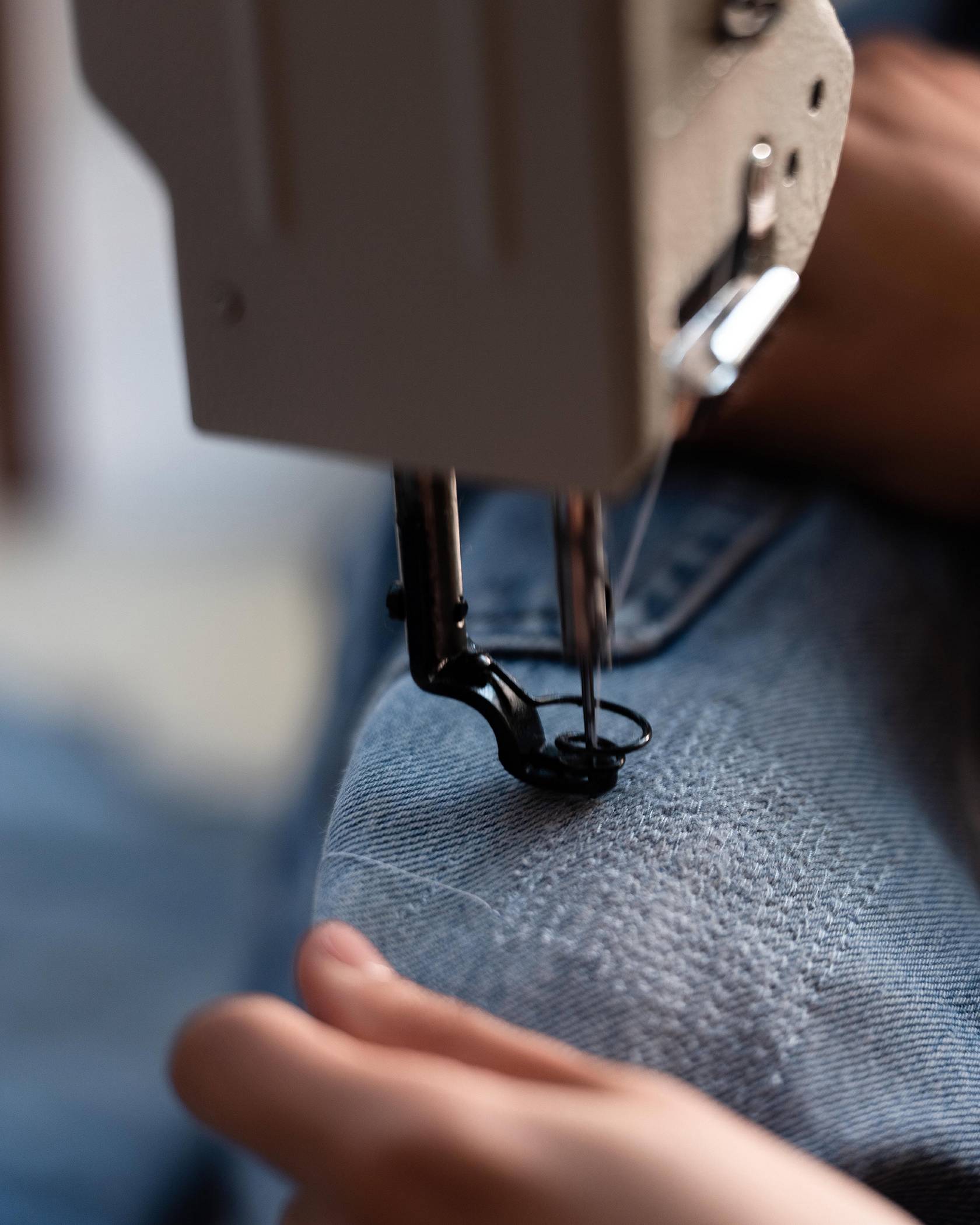 Denim being sewn