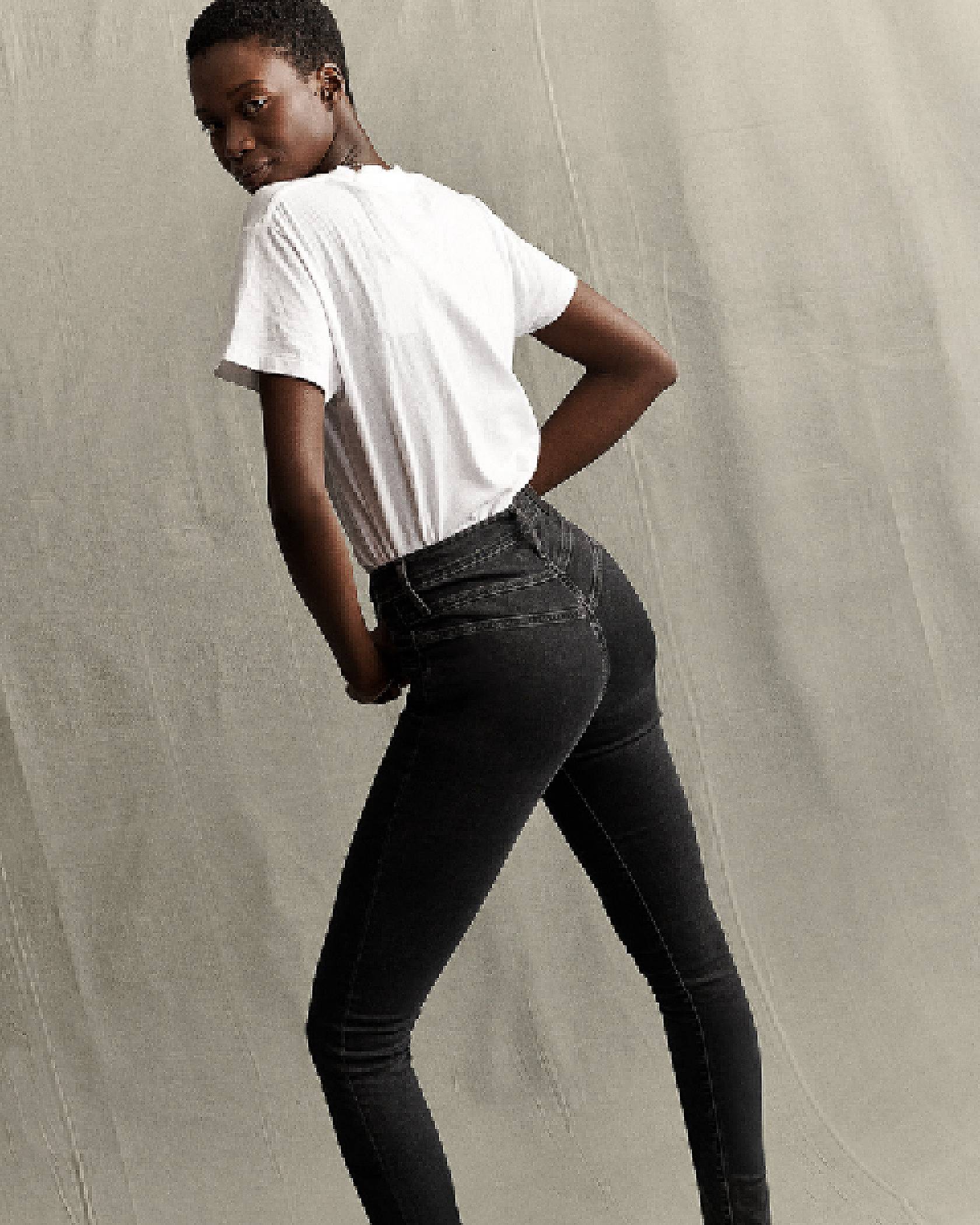 Model wearing a pair of Levi's® Mile High Super Skinny Jeans.