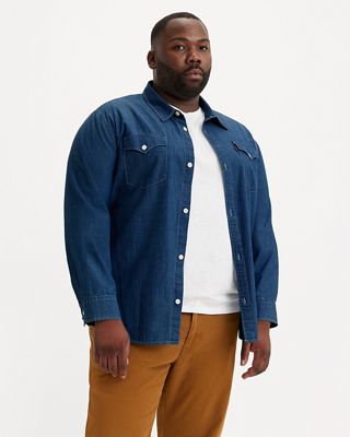 Model wearing jeans and a gray sweatshirt