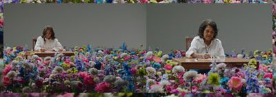 Two images split down the middle, one of Xiye Bastida and one of Dolores Huerta. Both are wearing all white sitting at a desk writing in a field of flowers.