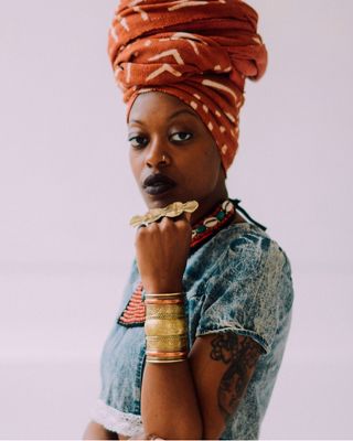 Brittsense resting arm under chin.