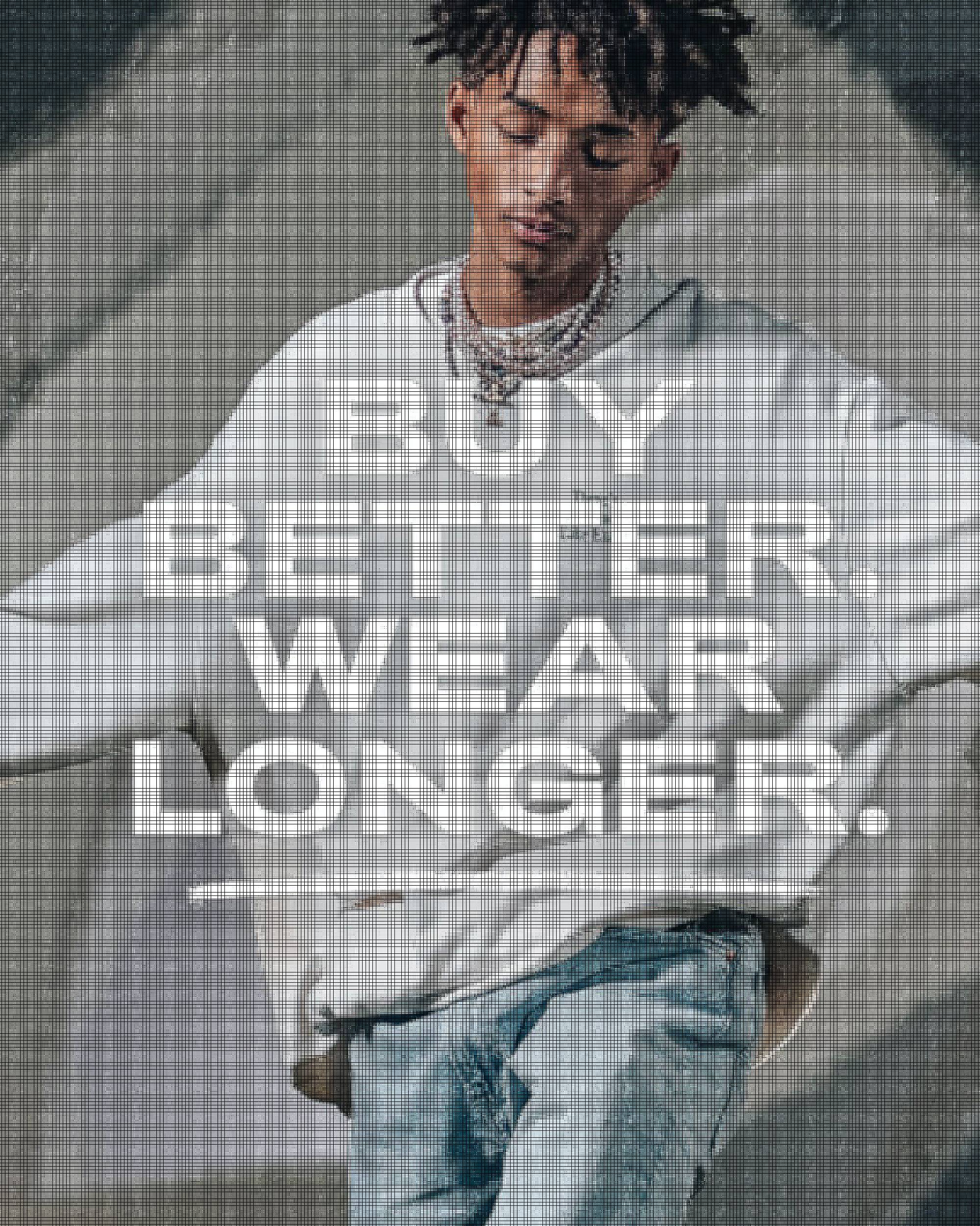 A photo of Jayden Smith wearing a grey sweatshirt with his arms spread out and the words, "Buy Better. Wear Longer." overlaid on the image.