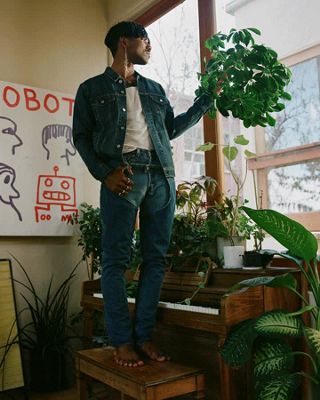 GIFs of Jerrod La Rue in his plant-filled home.