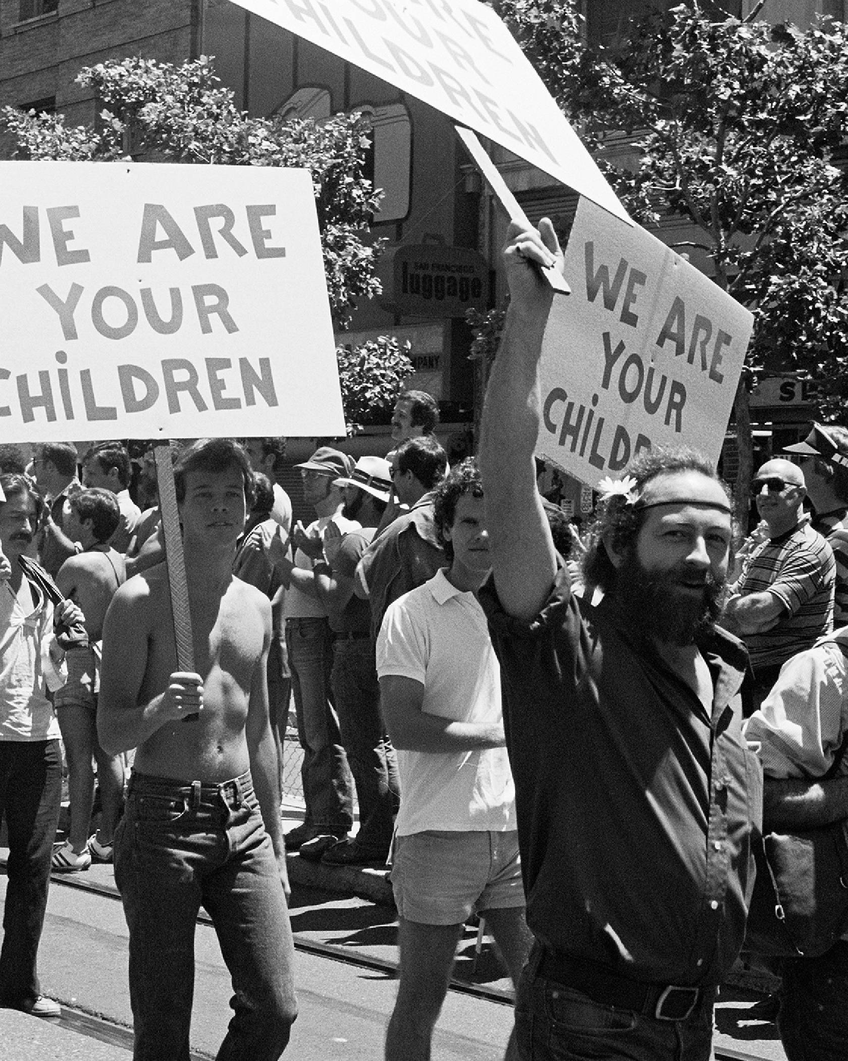 A black and white photo of people protesting