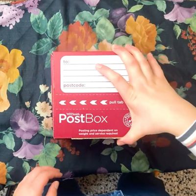 box centered on floral print scarf