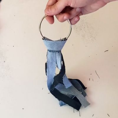 denim strips hung on metal ring