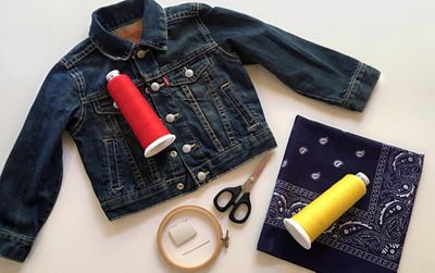 denim jacket and supplies laydown