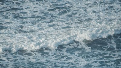 Photo of blue ocean waves.