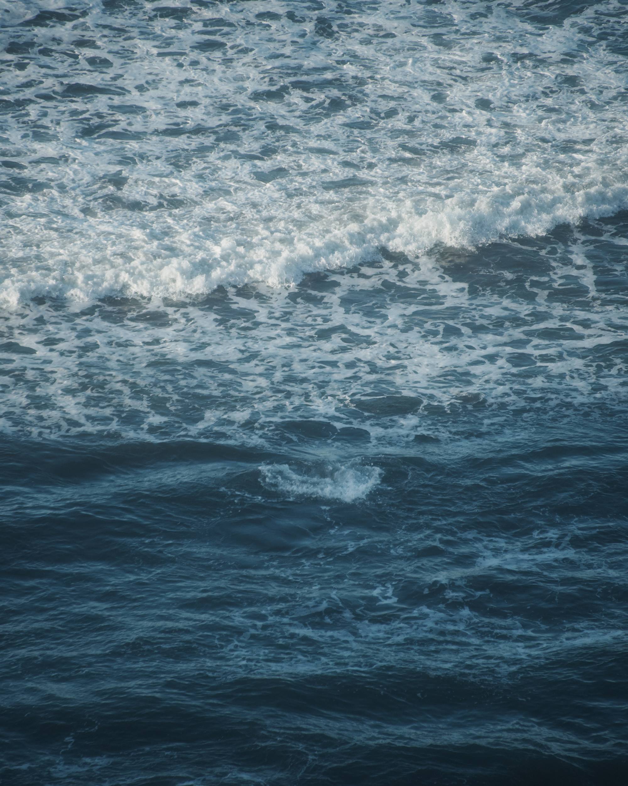 Photo of blue ocean waves.